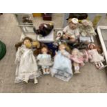 A LARGE ASSORTMENT OF VINTAGE DOLLS