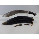 A KUKRI KNIFE AND SCABBARD, 28CM BLADE