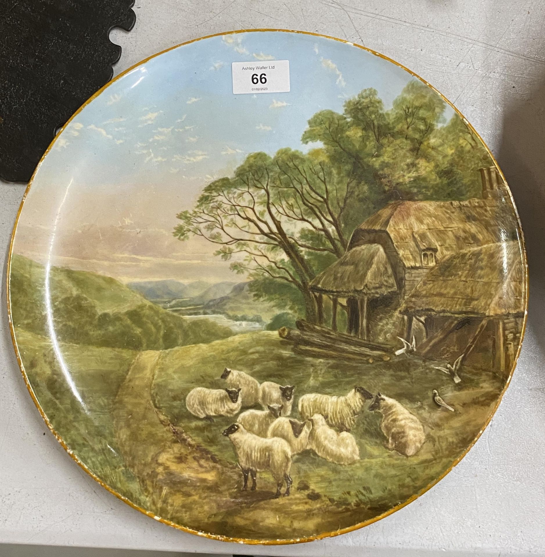 A HANDPAINTED COPELAND WALL CHARGER WITH AN IMAGE OF SHEEP - DIAMETER 31CM