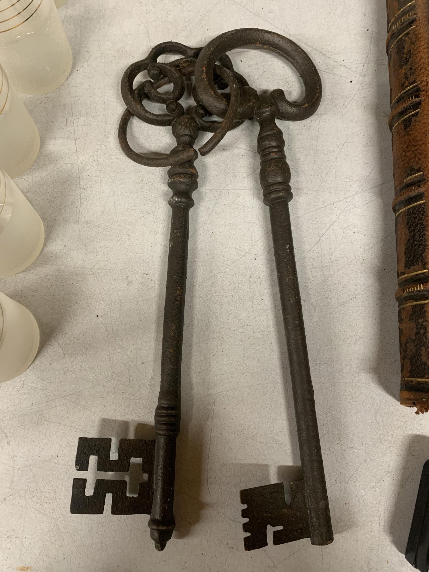 TWO VERY LARGE VINTAGE CAST KEYS ON A RING