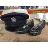A VINTAGE CHESHIRE FIRE BRIGADE CAP WITH ORIGINAL BADGE AND A VINTAGE PAIR OF BALLET SHOES
