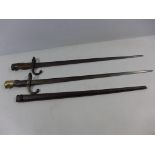 A FRENCH GRAS BAYONET AND SCABBARD DATED 1878, 52CM BLADE AND A FURTHER GRAS BAYONET (2)