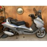 A PIAGGIO SCOOTER SOLD AS SEEN WITH NO PAPERWORK OR KEY AND DAMAGE TO THE LEFT HAND SIDE