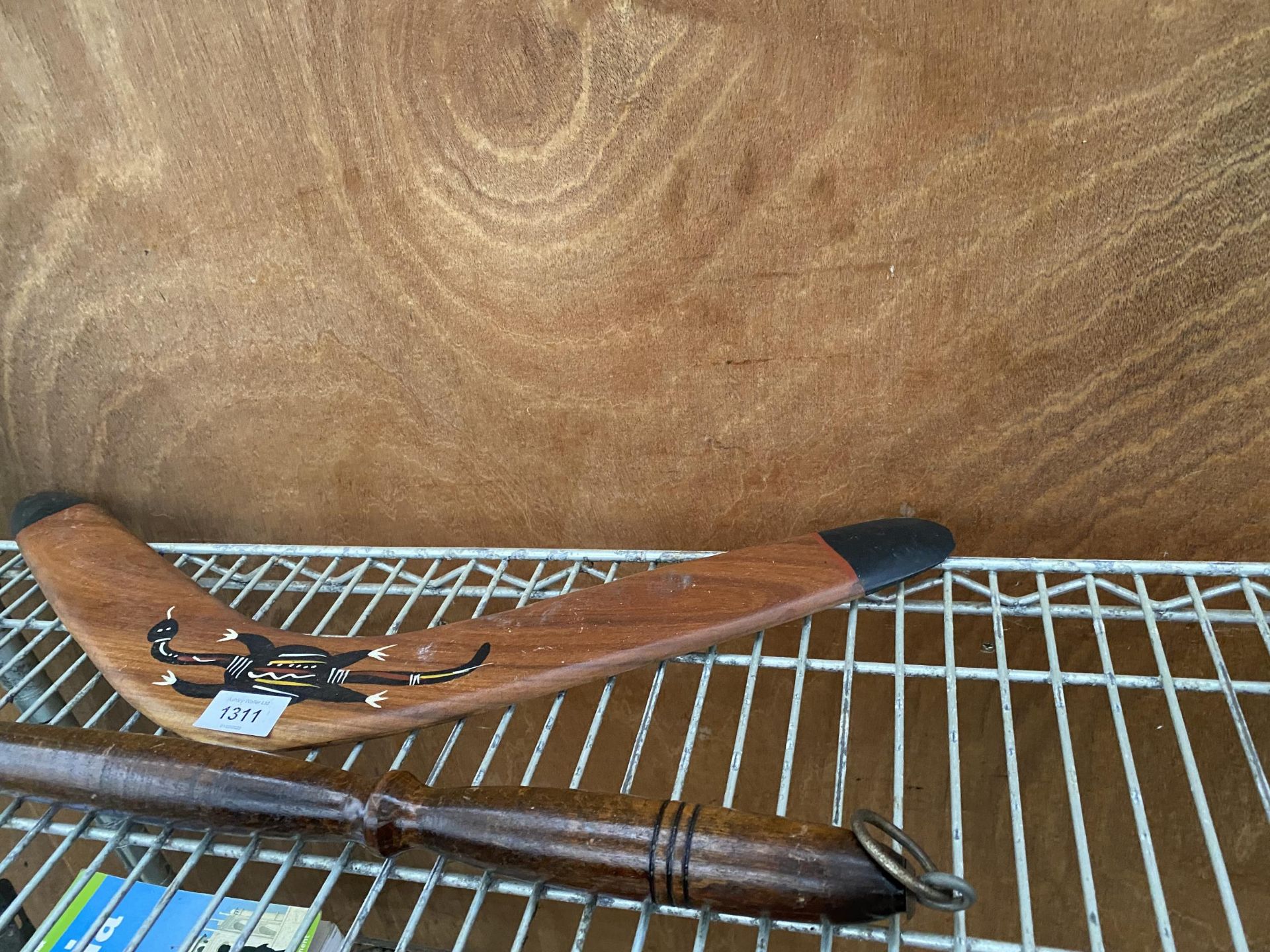 A TREEN BOOMERANG AND A MEDEVIL STYLE AXE