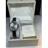 AN AURORA WRIST WATCH WITH CRYSTALS FROM SWAROVSKI IN A PRESENTATION BOX SEEN WORKING BUT NO