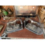 A PAIR OF BELIEVED BRONZE HOUND BOX ENDS ON MARBLE PLINTHS