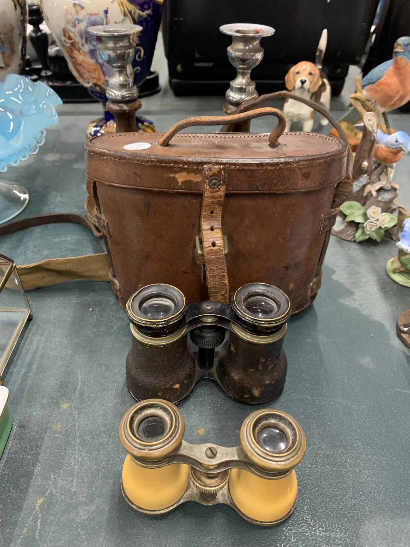 A PAIR OF WORLD WAR 1 PRISMATIC BINOCULARS IN LEATHER CASE BY J & J & CO MARKED 1916, ANOTHER