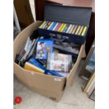 AN ASSORTMENT OF DVDS, CASSETTES AND GAMES ETC