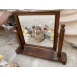 A WOODEN SWING FRAMED DRESSING TABLE MIRROR