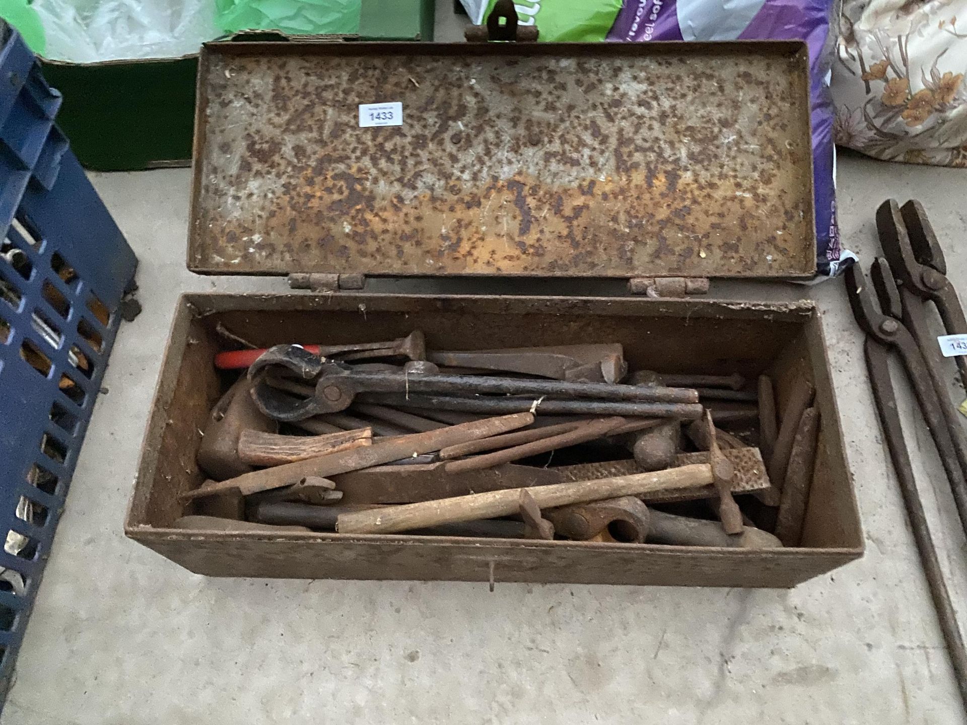 A VINTAGE METAL TOOL CHEST CONTAINING AN ASSORTMENT OF TOOLS TO INCLUDE RASPS AND PLIERS ETC