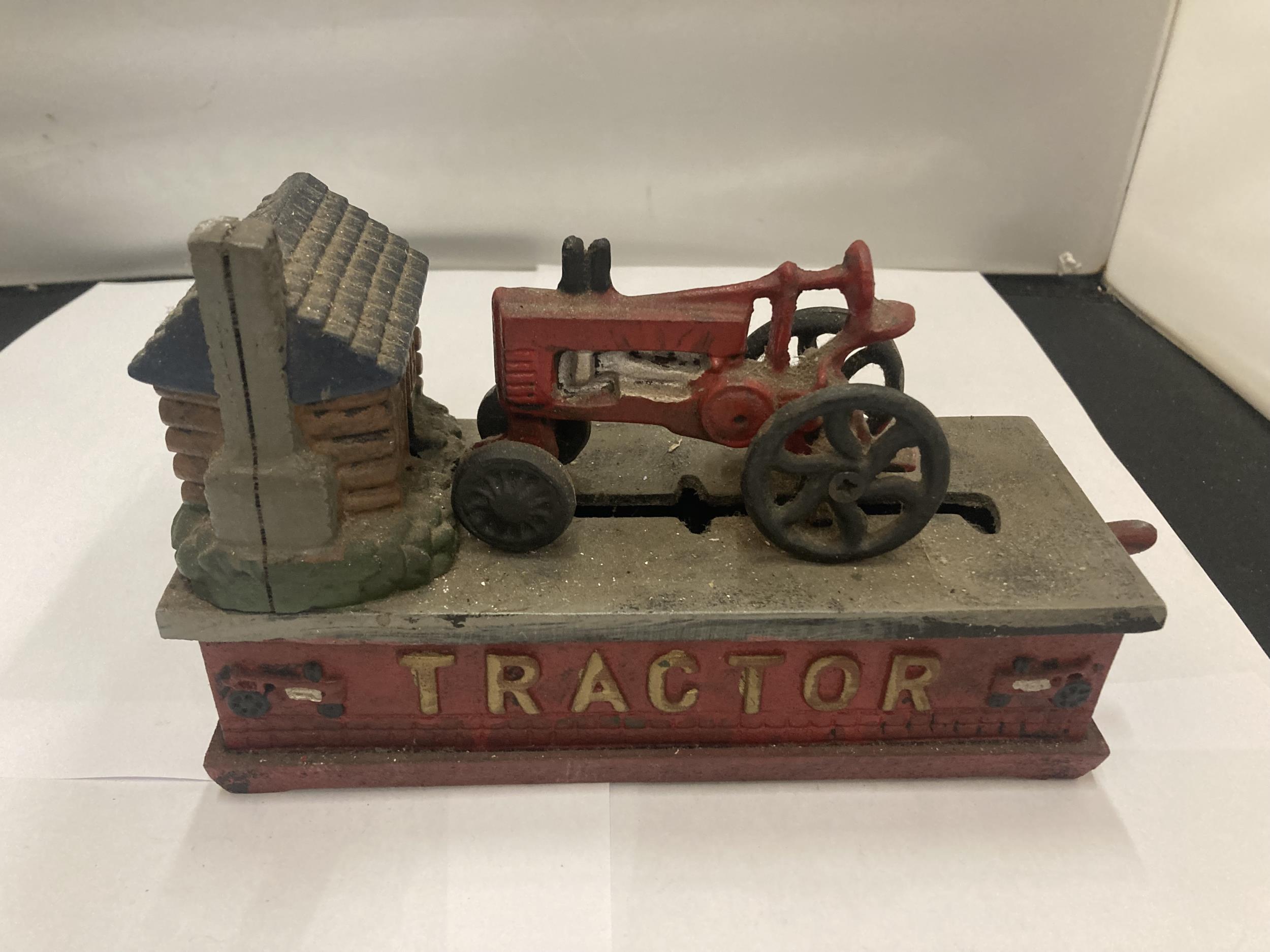 A VINTAGE STYLE CAST TRACTOR MONEY BANK