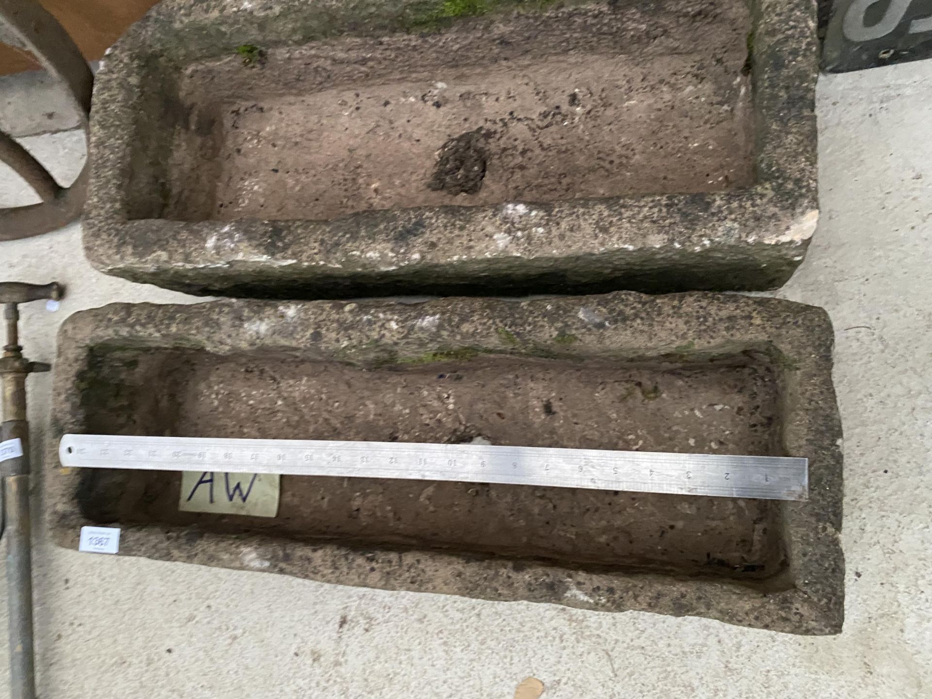 A PAIR OF RECONSTITUTED STONE PLANTER TROUGHS