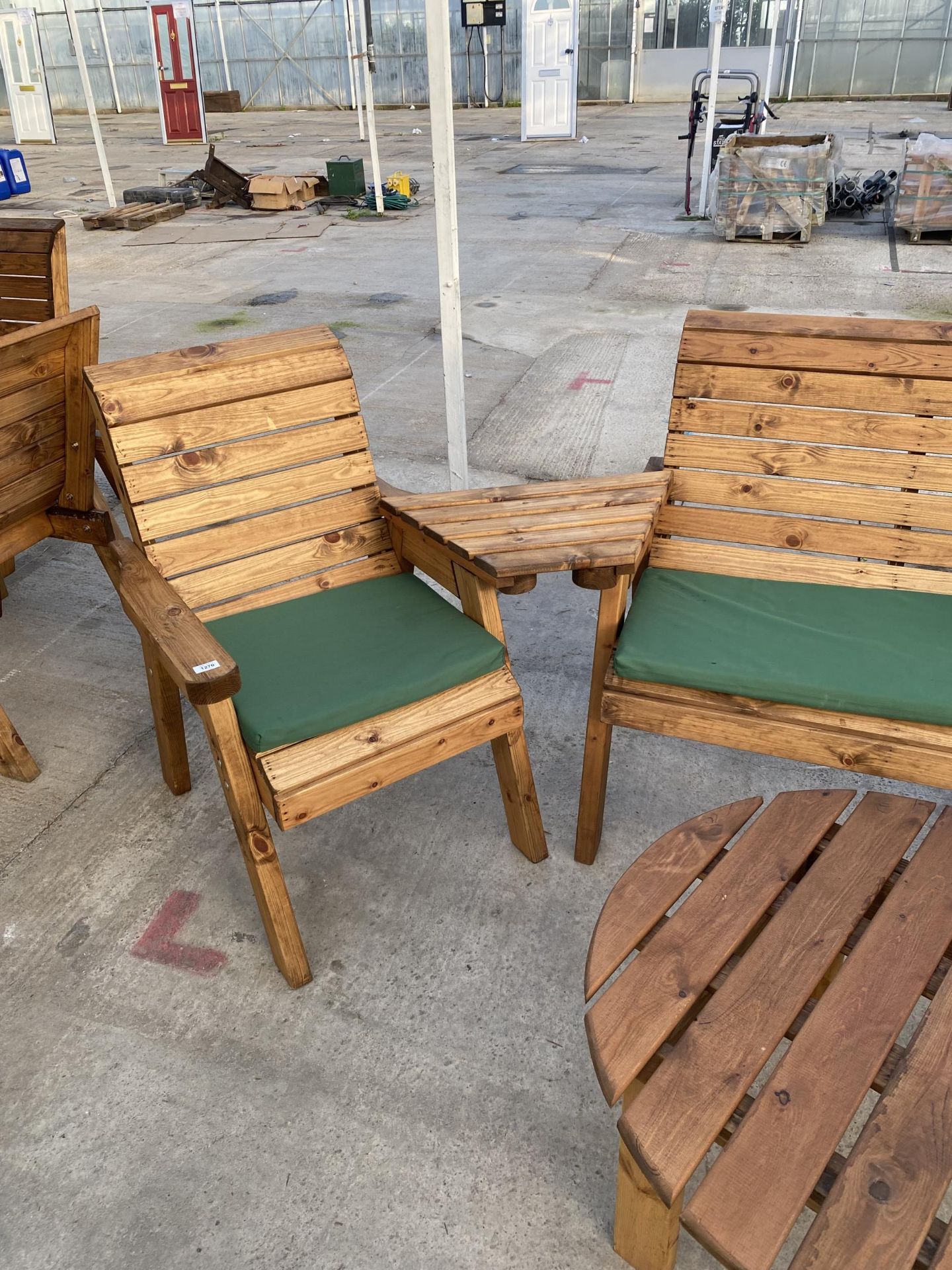 AN AS NEW EX DISPLAY CHARLES TAYLOR PATIO SET COMPRISING OF A BENCH, TWO CHAIRS, A ROUND COFFEE - Image 2 of 5