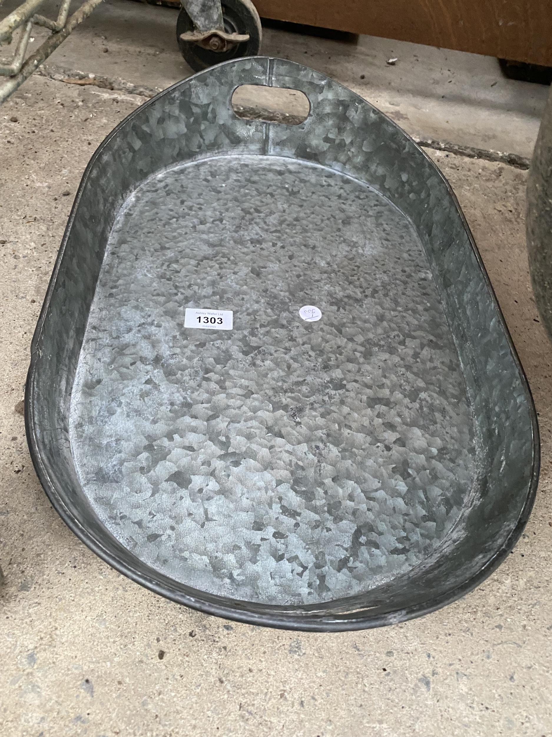 A GALVANISED SERVING TRAY