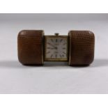 A VINTAGE MAPPIN LIZARD SKIN TRAVEL CLOCK WITH DATE