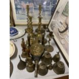 A QUANTITY OF BRASS ITEMS TO INCLUDE CANDLESTICKS, BELLS, BELLOWS, ETC