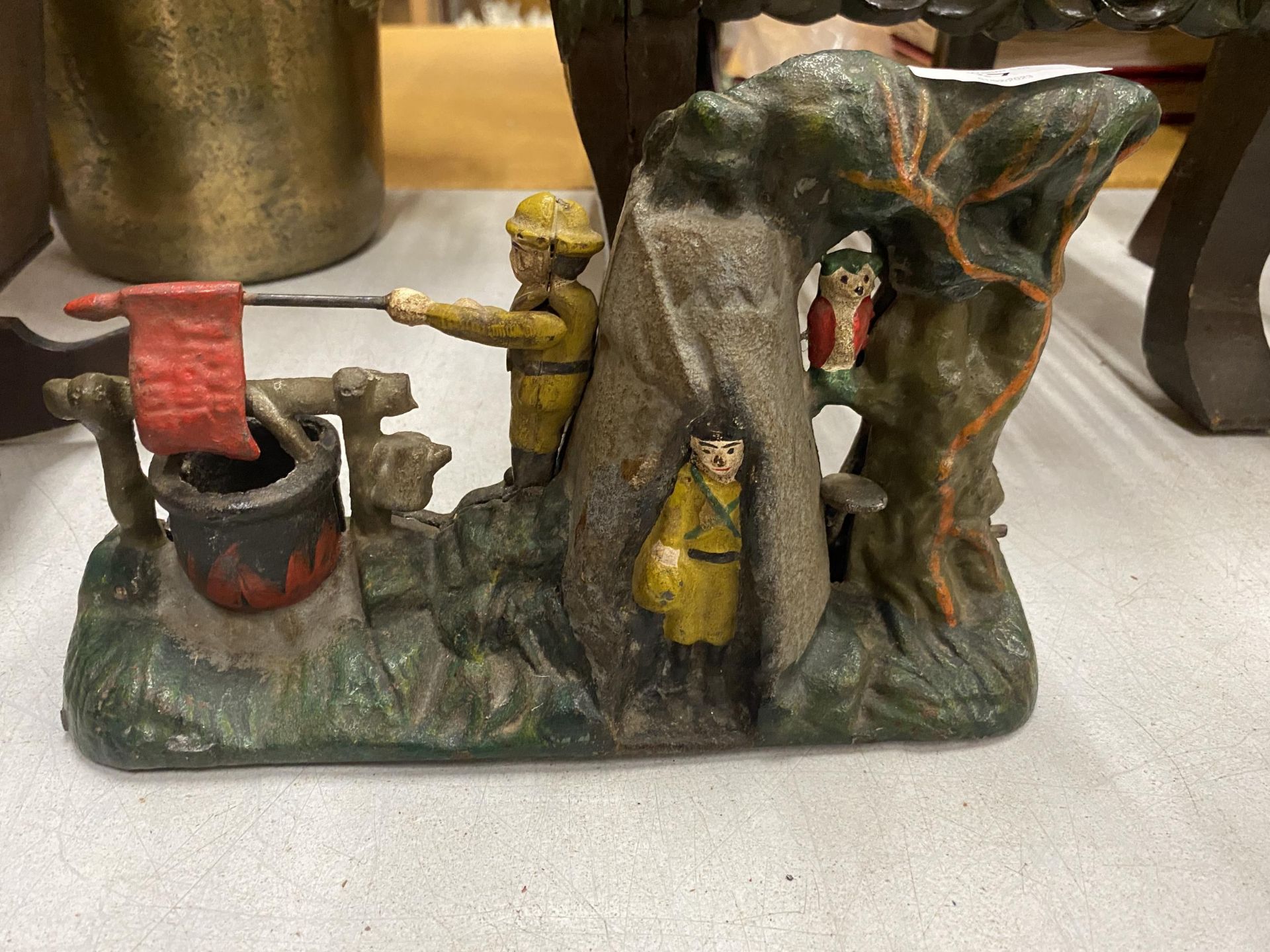 A CAST METAL MODEL OF A CAMPFIRE