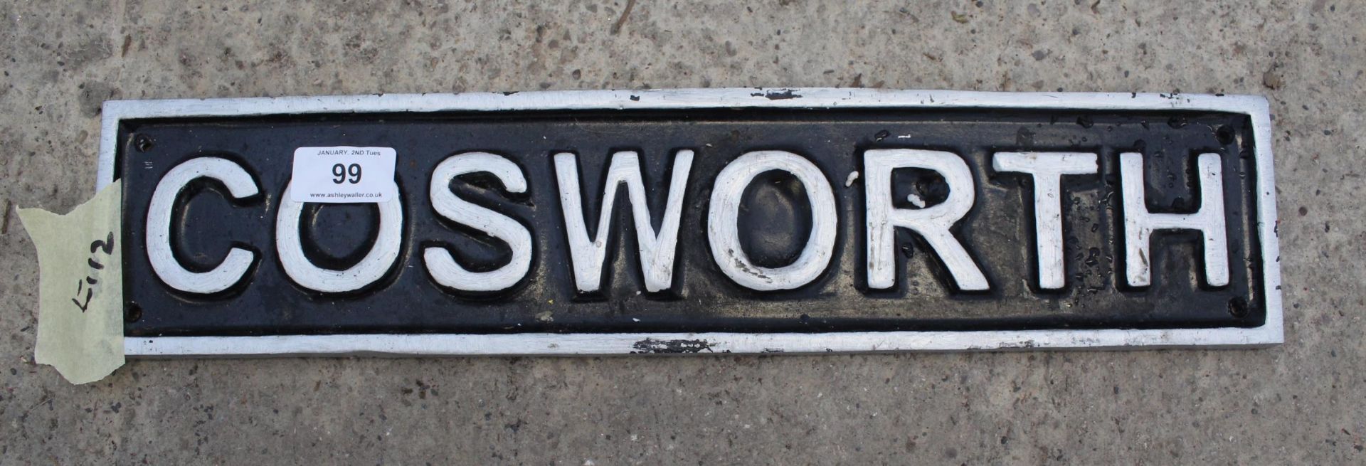 A LARGE RECTANGULAR CAST IRON COSWORTH SIGN PLUS VAT