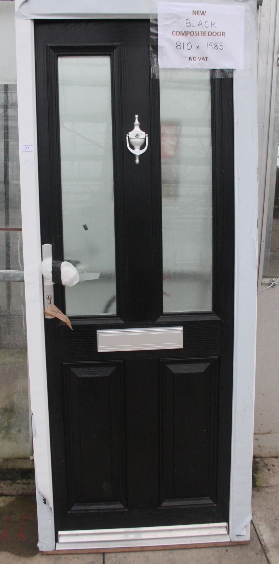 A NEW BLACK COMPOSITE DOOR AND FRAME 810MM X 1985MM LOCK AND KEYS IN LETTERBOX NO VAT