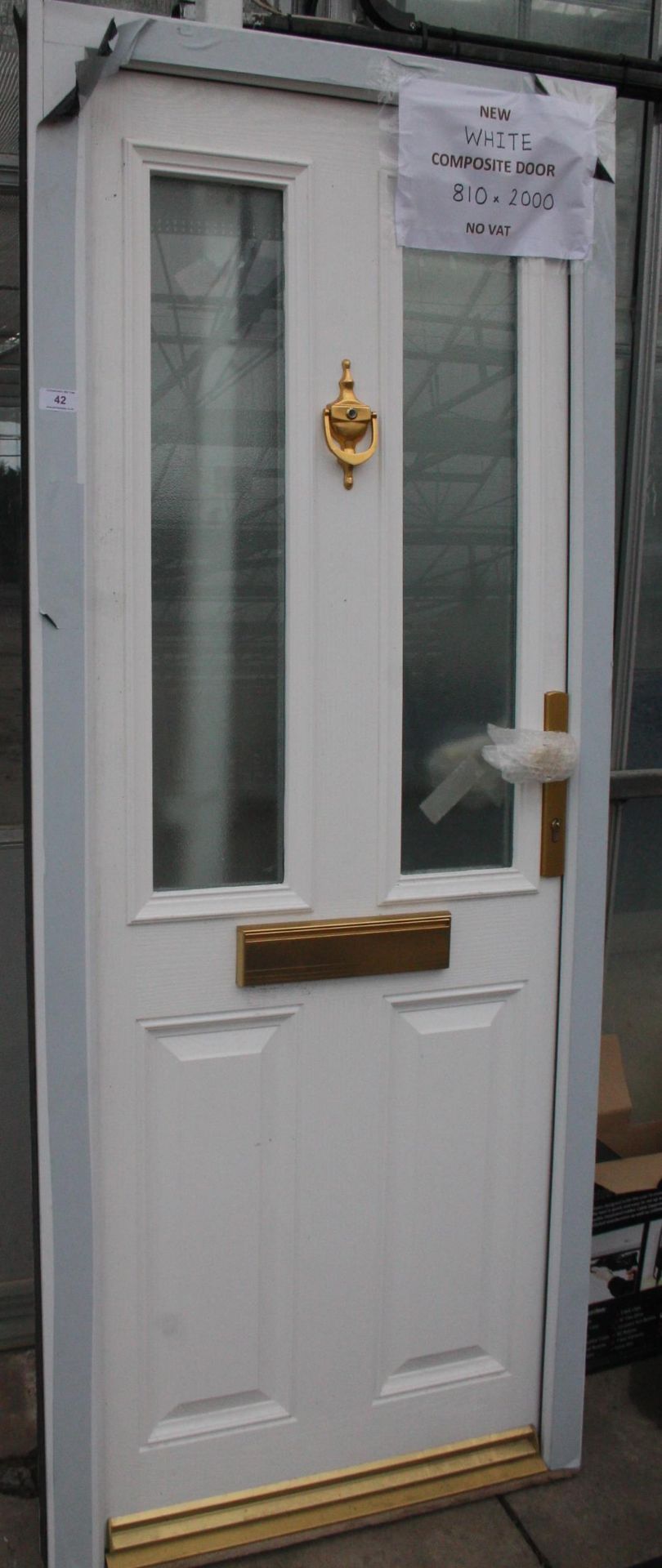 A NEW WHITE COMPOSITE DOOR AND FRAME 810MM X 2000MM LOCK AND KEYS IN LETTERBOX NO VAT