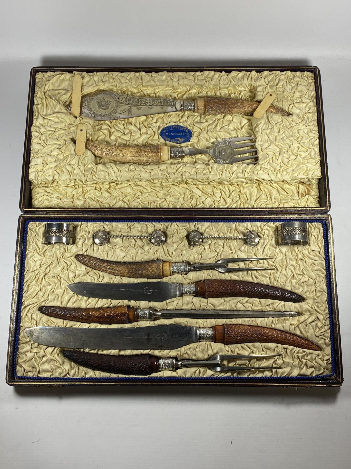 A VINTAGE LLOYD PAYNE & AMIEL, MANCHESTER CARVING SET WITH SHEFFIELD HALLMARKED SILVER FERRULES