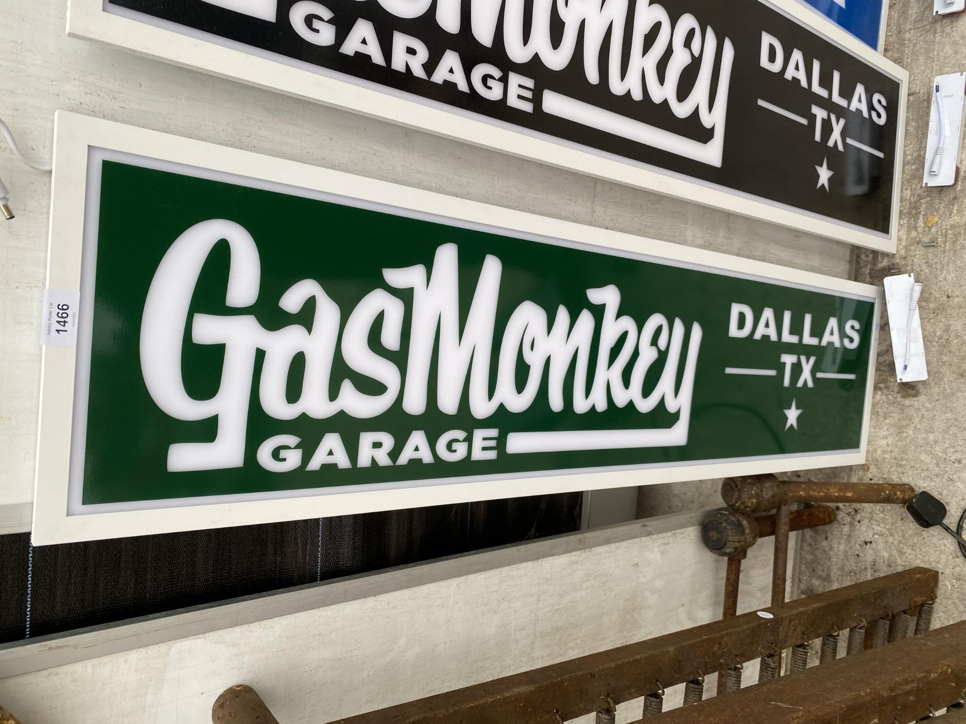 AN ILLUMINATED 'GAS MONKEY' SIGN WITH ADAPTER BUT NO PLUG