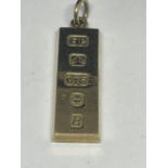 A 9 CARAT GOLD INGOT GROSS WEIGHT 30.9 GRAMS