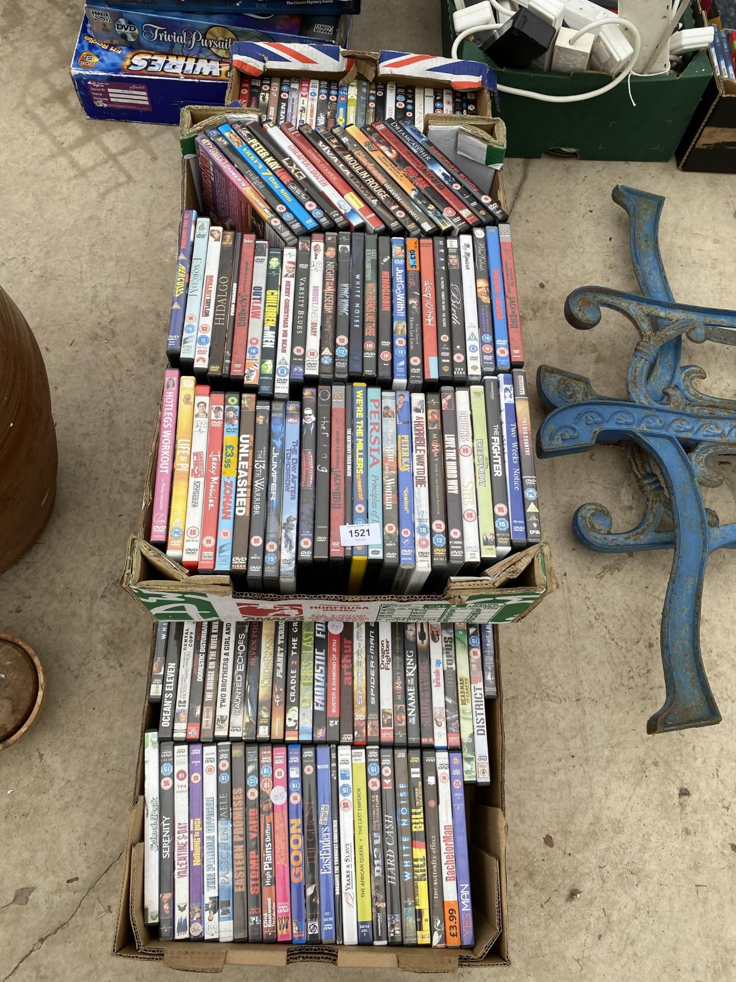 A LARGE ASSORTMENT OF DVDS