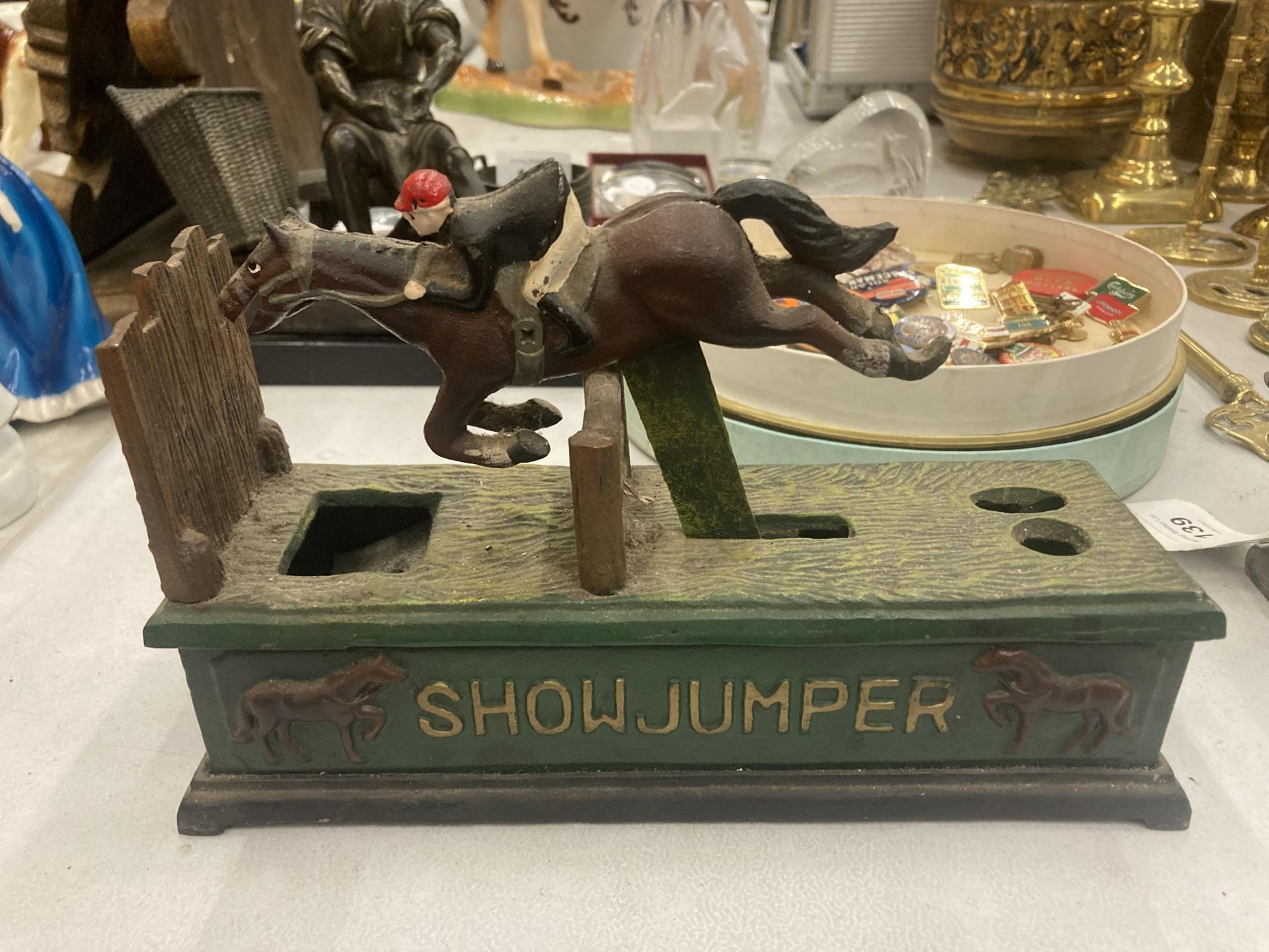 A CAST VINTAGE STYLE 'SHOWJUMPER' MONEY BANK