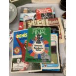 A QUANTITY OF MANCHESTER UNITED PROGRAMMES TO INCLUDE THE DENIS LAW TESTIMONIAL, SIGNED