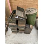 AN ASSORTMENT OF VINTAGE OIL CANS AND METAL DRAWERS