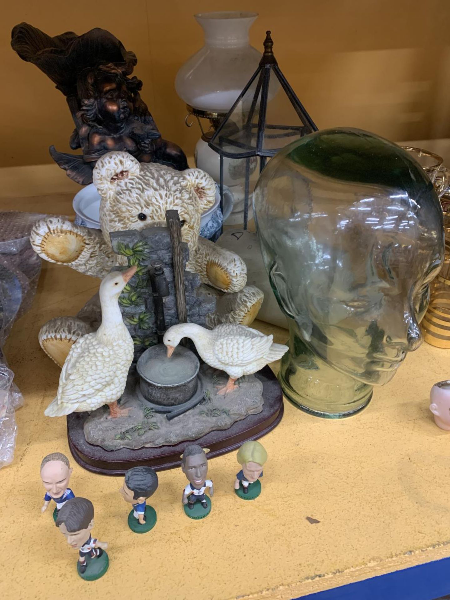 A MIXED LOT TO INCLUDE A GLASS HEAD, OIL LAMP, SMALL TERRARIUM, FIGURES, ETC