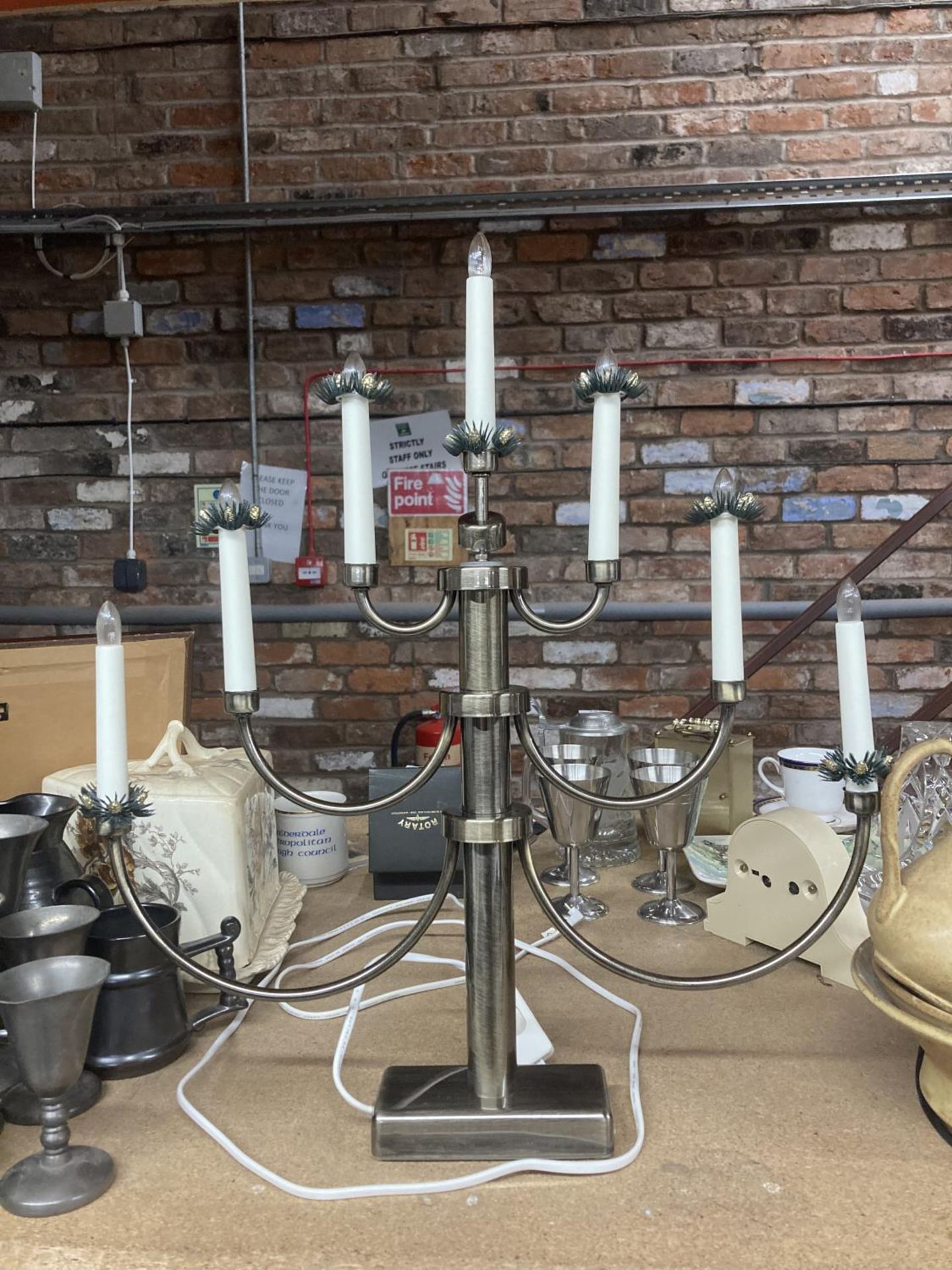 A CHRISTMAS CANDLEABRA WITH ELECTRIC CANDLES ON SEVEN BRANCHES HEIGHT 53CM