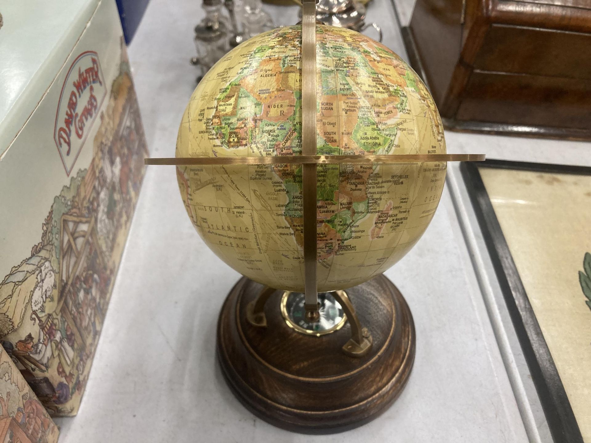A WORLD GLOBE WITH A COMPASS ON A WOODEN BASE HEIGHT APPROX 24CM - Image 2 of 3