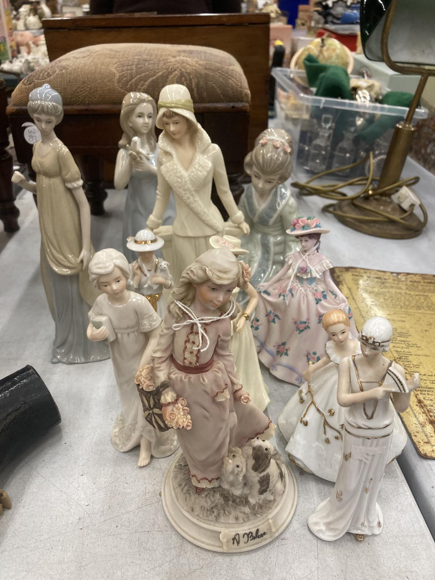 A COLLECTION OF LADY FIGURES TO INCLUDE REGENCY FINE ARTS, REGAL, ETC