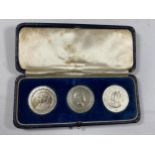 A CASED SET OF THREE HALLMARKED SILVER COMMEMORATIVE MEDALS