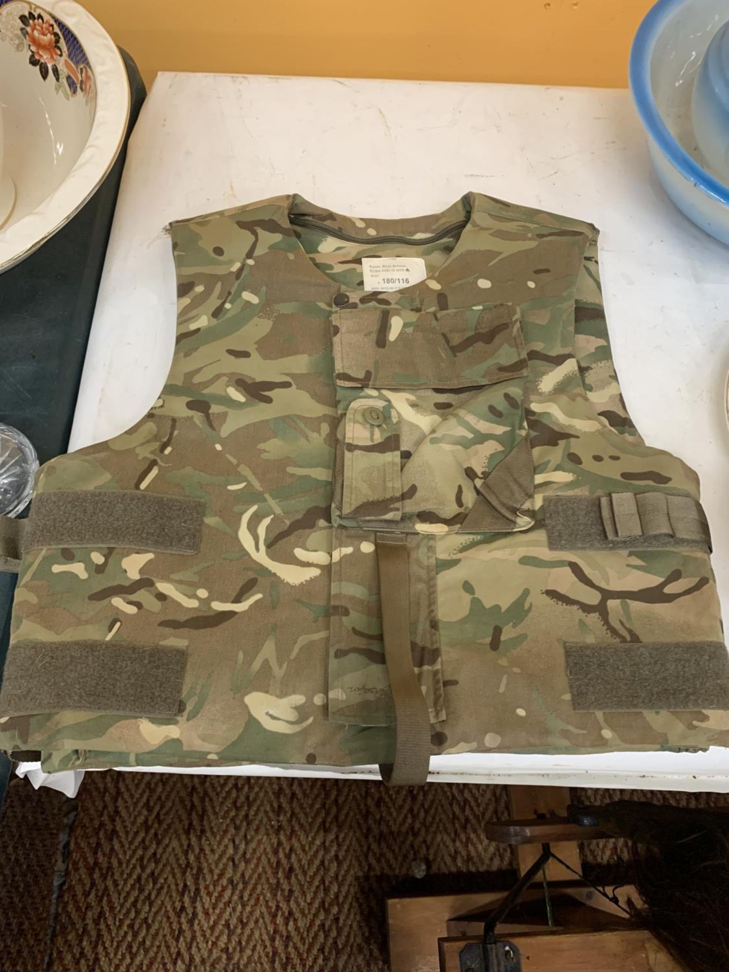 A CAMOUFLAGE BULLET PROOF VEST