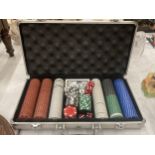 A POKER SET WITH POKER CHIPS, CARDS AND DICE IN AN ALUMINIUM CASE