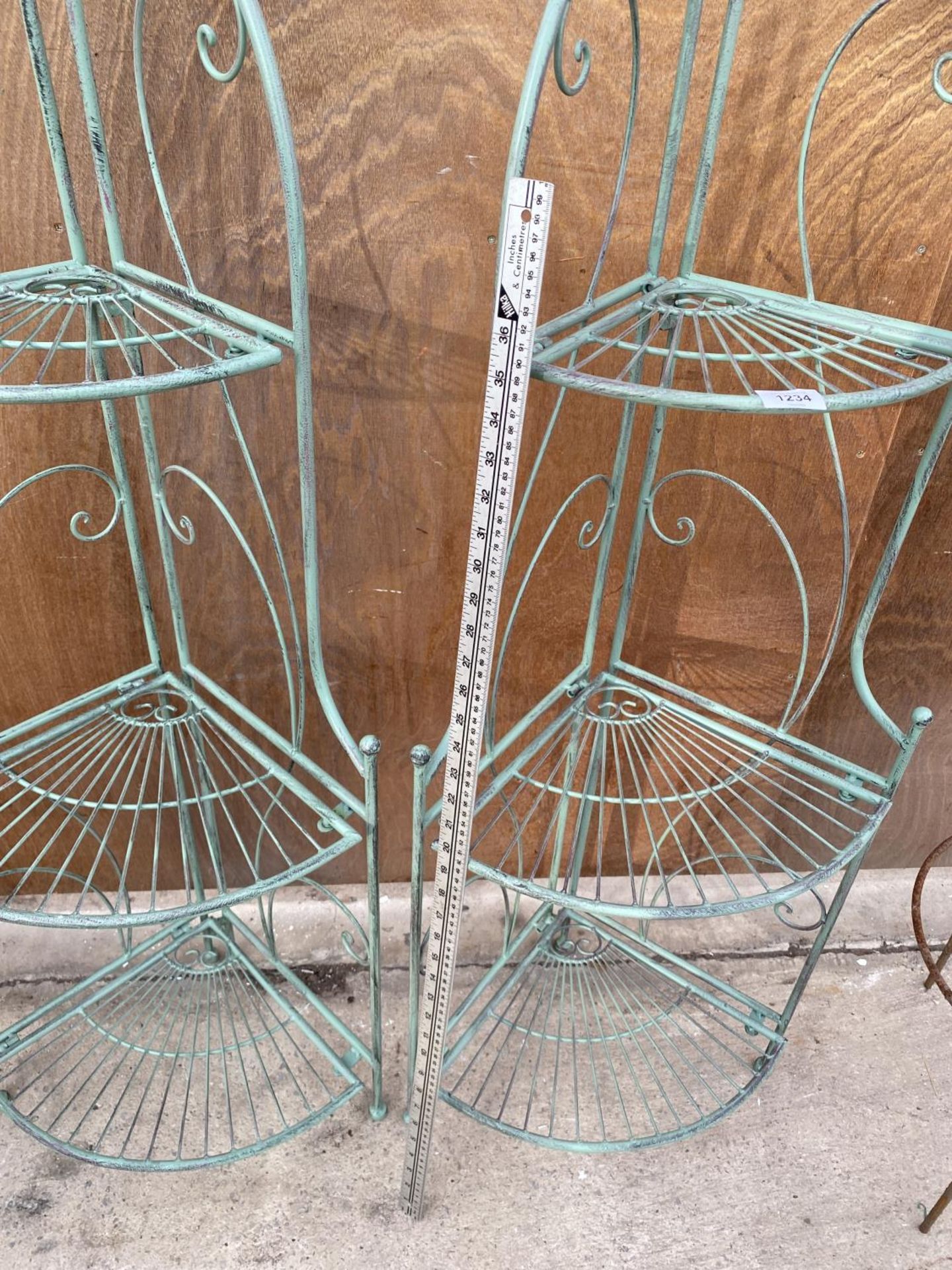 A PAIR OF GREEN PAINTED WROUGHT IRON THREE TIER CORNER WHAT-KNOTS - Image 2 of 2