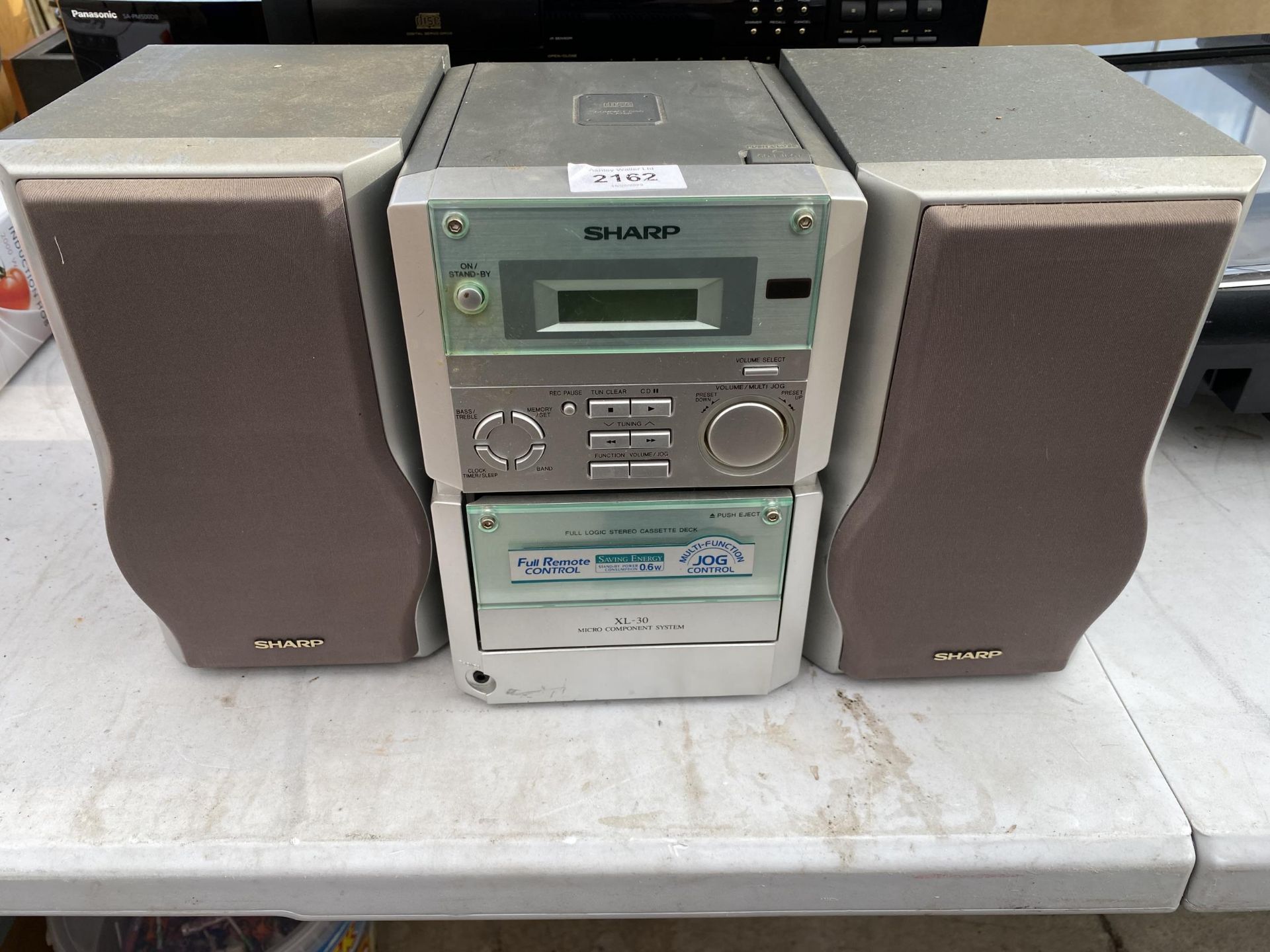 A SHARP STEREO SYSTEM WITH TWO SPEAKERS