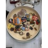 A QUANTITY OF BADGES IN A VINTAGE BARKER AND DOBSON CHOCOLATE BOX