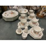 A JOHNSON BROS PART DINNER SERVICE TO INCLUDE DINNER PLATES, BOWLS, CUPS, SAUCERS, SIDE PLATES, AN