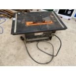 AN ELECTRIC CHALLANGE TABLE SAW