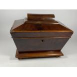 A VINTAGE MAHOGANY TEA CADDY WITH TWO INNER COMPARTMENTS