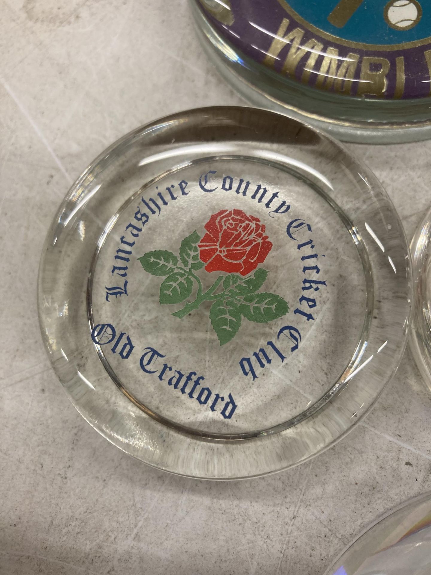 A QUANTITY OF GLASS PAPERWEIGHTS WITH SPORTING THEMES - Image 4 of 4