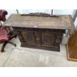 AN 18TH CENTURY HEAVILY CARVED TWO DOOR CABINET, 49" WIDE