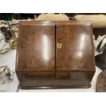 A VINTAGE WALNUT STATIONERY CABINET HEIGHT 28CM, LENGTH 38CM, DEPTH 23CM