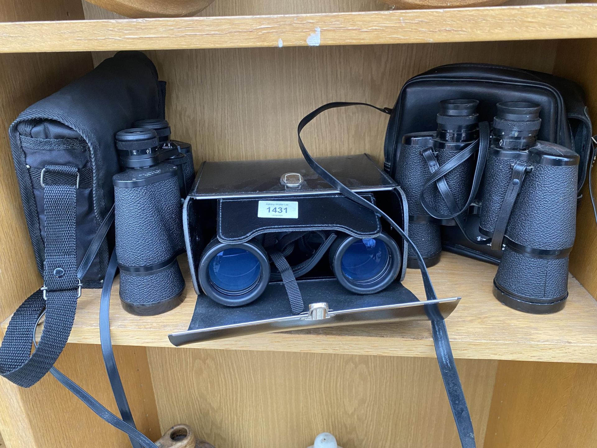 THREE CASED PAIRS OF BINOCULARS TO INCLUDE TASCO ETC