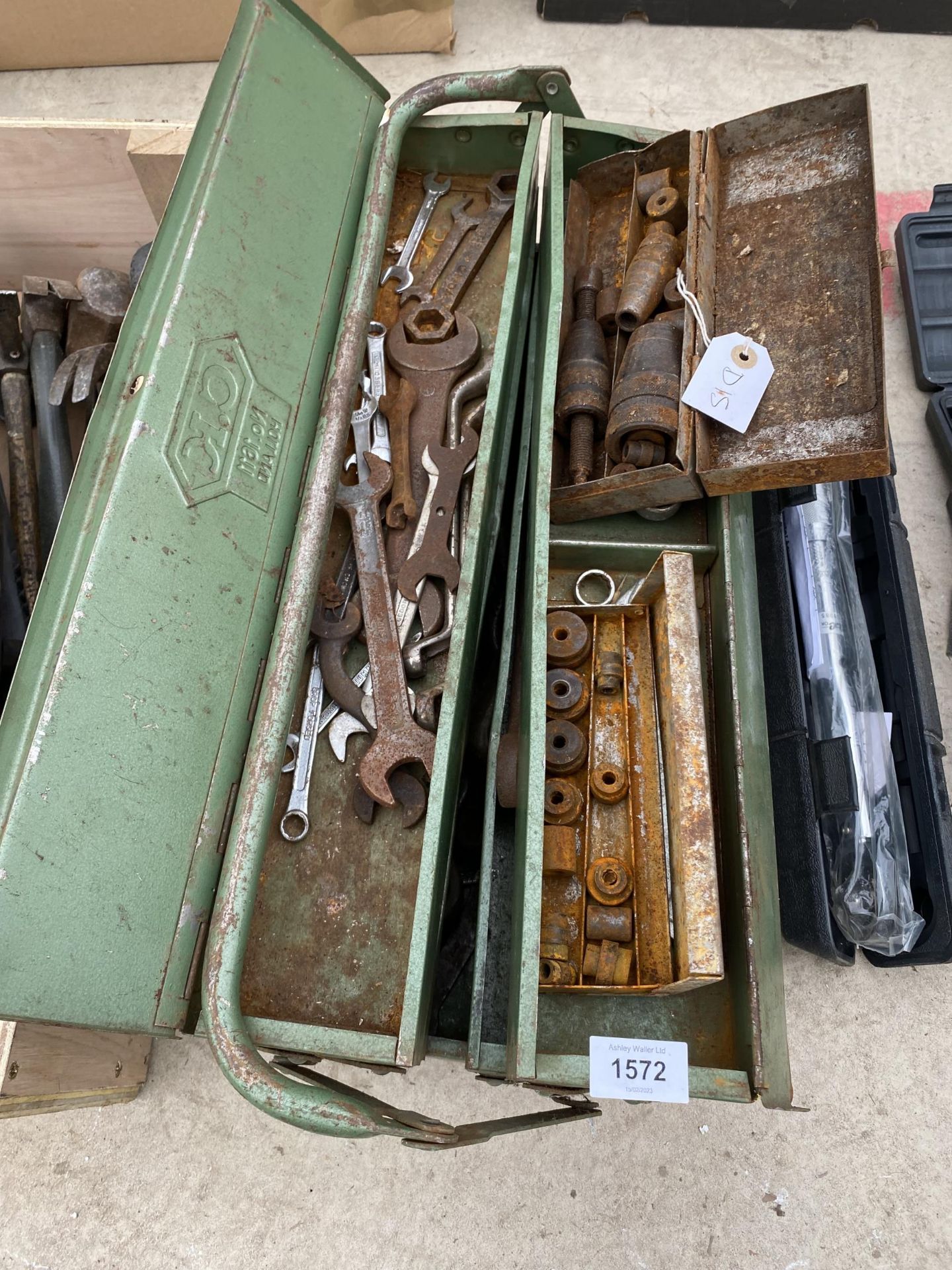 A METAL TOOL BOX CONTAINING AN ASSORTMENT OF SPANNERS