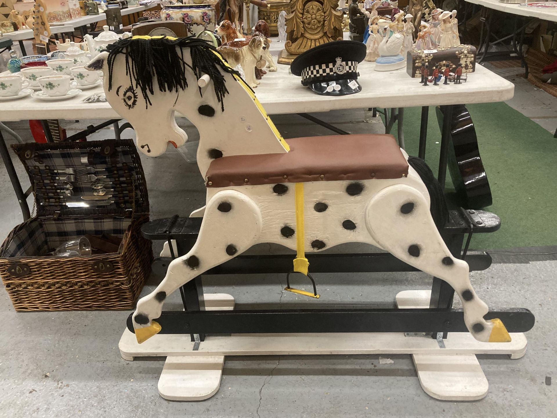 A LARGE WOODEN ROCKING HORSE, HEIGHT TO SEAT APPROX 63CM LENGTH 124CM